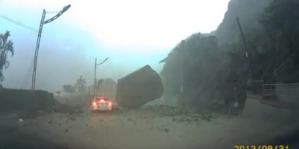 Boulder Almost Crushes Car in...