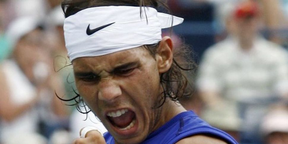 Nadal Brushes Federer Aside to...