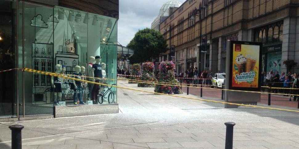Large Sheet of Glass Falls Fro...