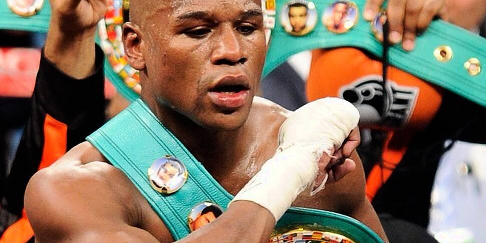 Mayweather Retains WBA & WBC T...