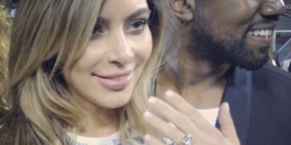 Kim flaunts engagement ring