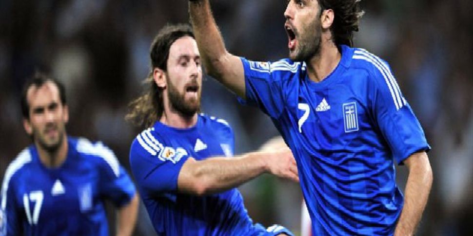 Late Samaras Penalty Sends Gre...