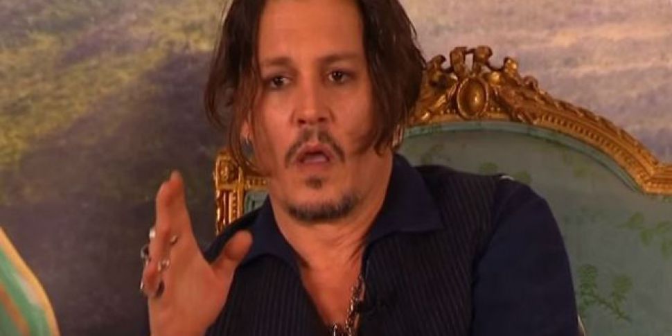 Johnny Depp Pokes Fun At Dog S...