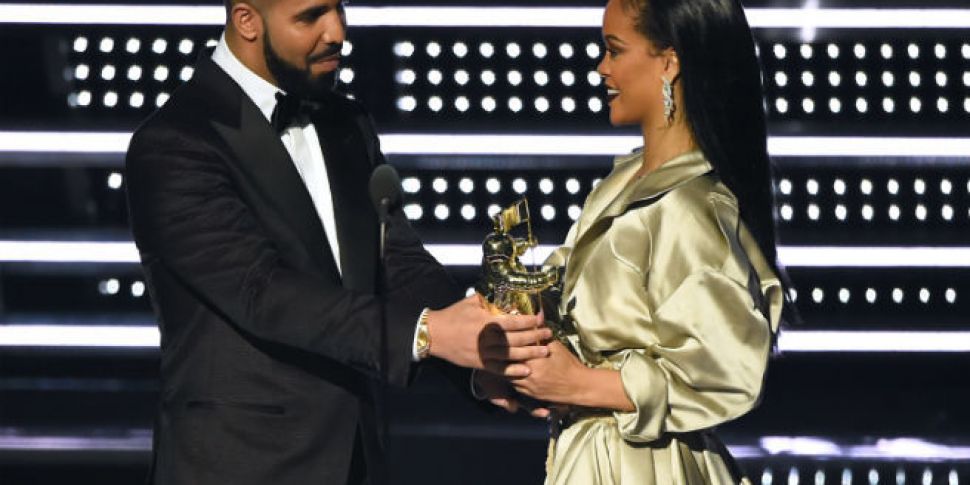 Drake Leans In To Kiss Rihanna...