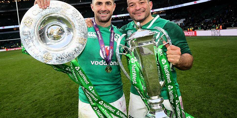 Rory Best and Rob Kearney sign...