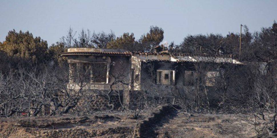 Greek Wildfire Death Toll Pass...