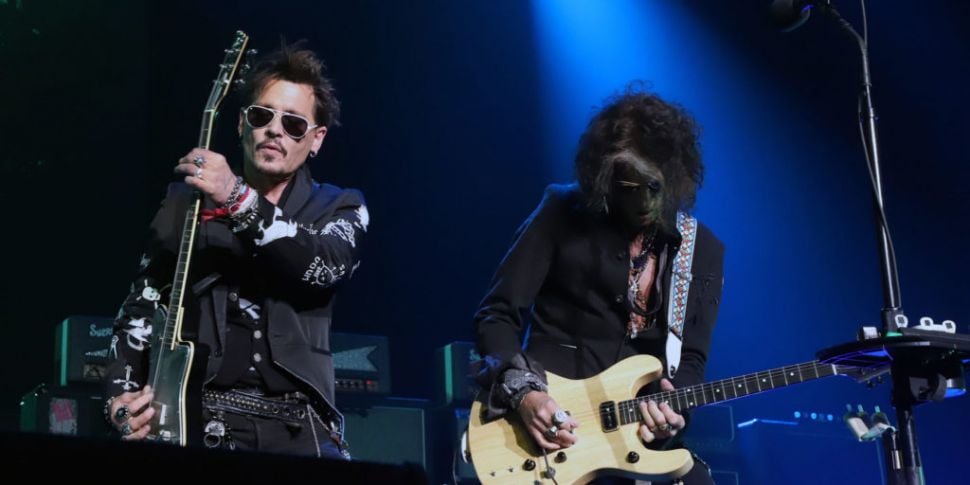 Johnny Depp Donates Guitar To...