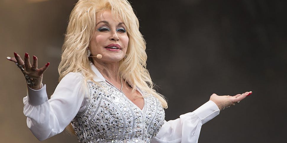 Dolly Parton Shares Rare Photo...