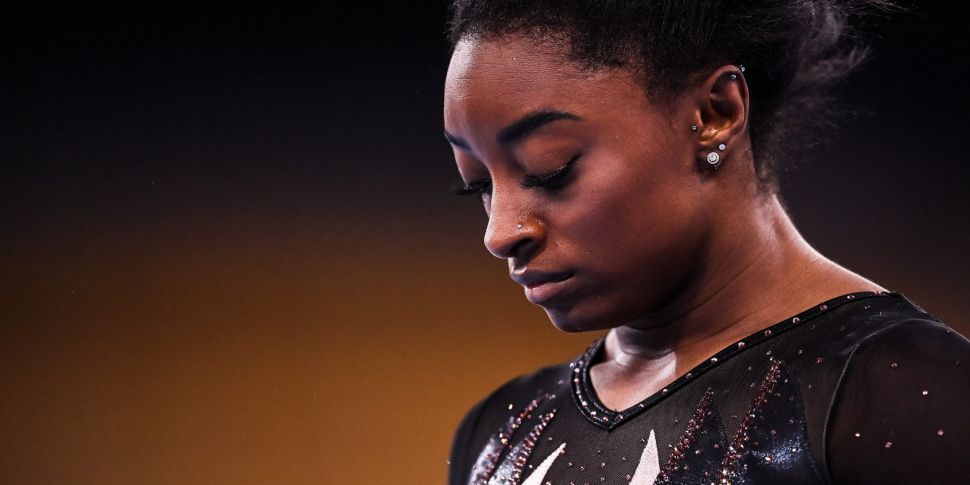 Simone Biles withdraws from tw...