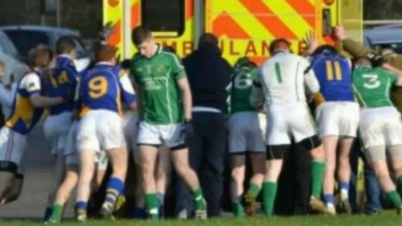 Meath GAA Players Pushing An Ambulance Carrying An Injured Player