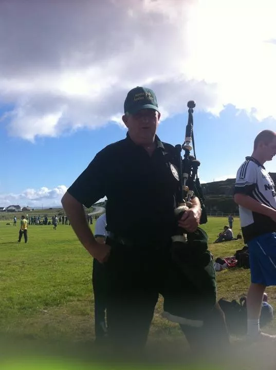 Alec Brown, Arranmore piper for the games, played the national anthem to begin tournament