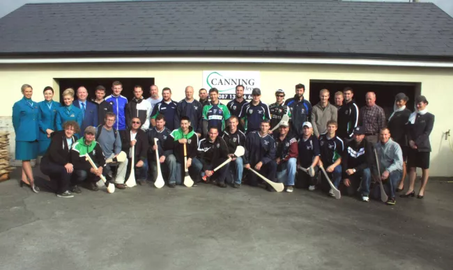 Cabin crew from Aer Lingus and Etihad Airways with Joe Canning and team members from The Barley House Wolves and Allentown Hibernians at Canning Hurls in Portumna. Photo: Lisa Regan