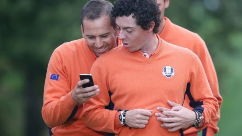 Sergio Garcia and Rory McIlroy share an intimate moment.