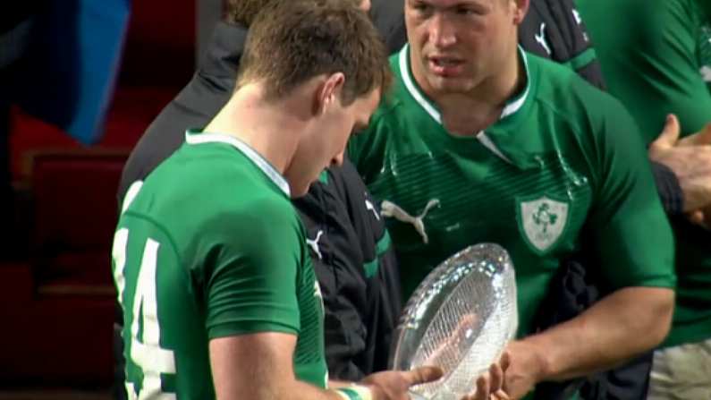 Craig Gilroy Inspecting His Man Of The Match Trophy