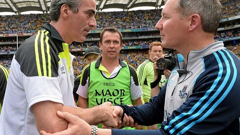 31 August 2014; Donegal manager Jim McGuinness with Dublin manager Jim Gavin at the end of the game. GAA Football All Ireland Senior Championship, Semi-Final, Dublin v Donegal, Croke Park, Dublin. Picture credit: David Maher / SPORTSFILE