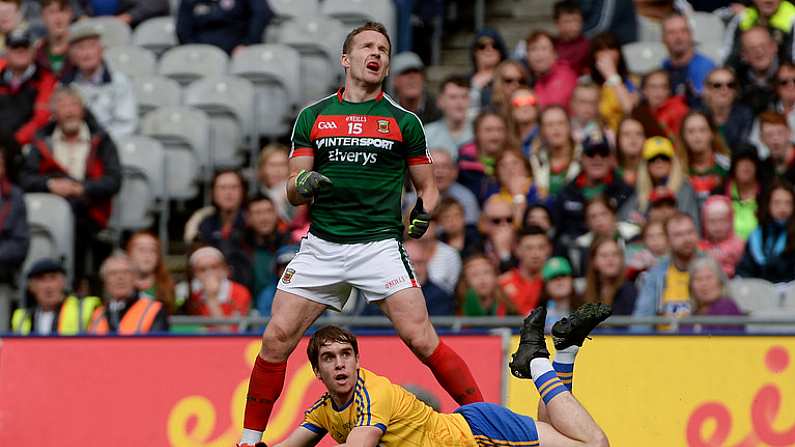 30 July 2017; Andy Moran of Mayo rects after kicking a wide under pressure from David Murray of Roscommon during the GAA Football All-Ireland Senior Championship Quarter-Final match between Mayo and Roscommon at Croke Park in Dublin. Photo by Piaras O Midheach/Sportsfile