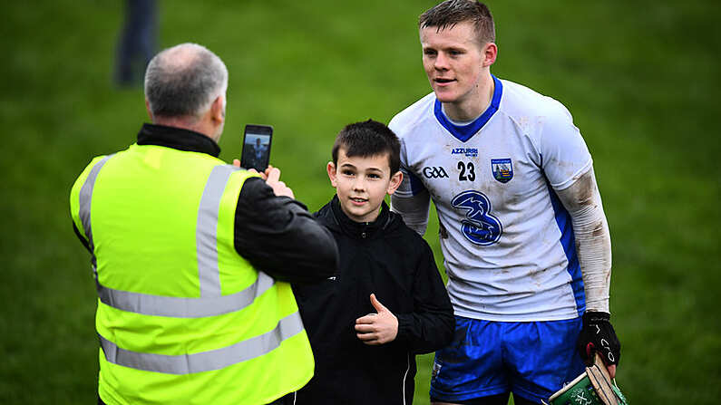 19 January 2017; Tom Devine of Waterford poses for a photographer with a supporter following the Allianz Hurling League Division 1A Round 2 match between Waterford and Tipperary at Walsh Park in Waterford. Photo by Stephen McCarthy/Sportsfile