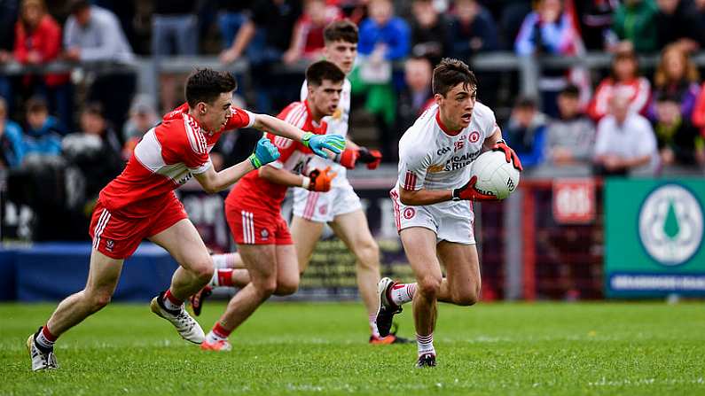 28 May 2017; Darragh Canavan of Tyrone in action against Sean McKeever of Derry during the Electric Ireland GAA Ulster GAA Football Minor Championship Quarter-Final match between Derry and Tyrone at Celtic Park in Derry. Photo by Ramsey Cardy/Sportsfile