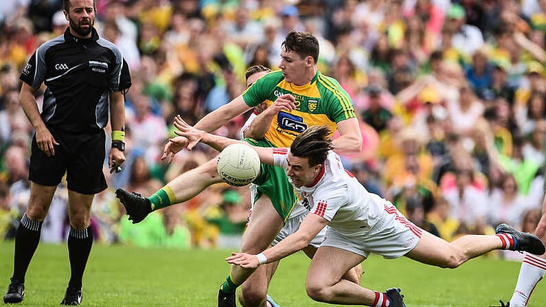 18 June 2017; Jamie Brennan of Donegal  in action against Conall McCann of Tyrone during the Ulster GAA Football Senior Championship Semi-Final match between Tyrone and Donegal at St Tiernach's Park in Clones, Co. Monaghan. Photo by Oliver McVeigh/Sportsfile