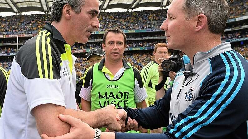 31 August 2014; Donegal manager Jim McGuinness with Dublin manager Jim Gavin at the end of the game. GAA Football All Ireland Senior Championship, Semi-Final, Dublin v Donegal, Croke Park, Dublin. Picture credit: David Maher / SPORTSFILE