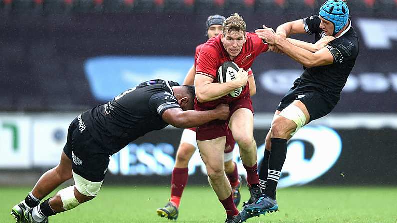 16 September 2017; Chris Farrell of Munster is tackled by Ma'afu Fia, left, and Justin Tipuric of Ospreys during the Guinness PRO14 Round 3 match between Ospreys and Munster at Liberty Stadium in Swansea. Photo by Ben Evans/Sportsfile