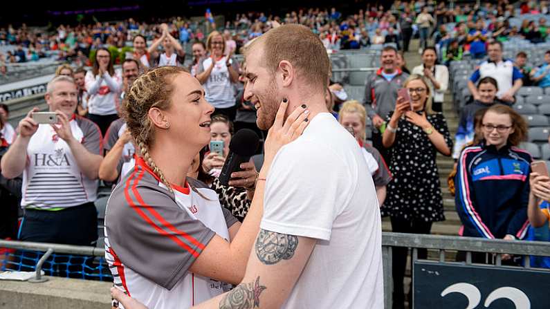 24 September 2017; Derry's Ciara McGurk with her boyfriend Ryan McCloskey after he proposed to her following the TG4 Ladies Football All-Ireland Junior Championship Final match between Derry and Fermanagh at Croke Park in Dublin. Photo by Cody Glenn/Sportsfile