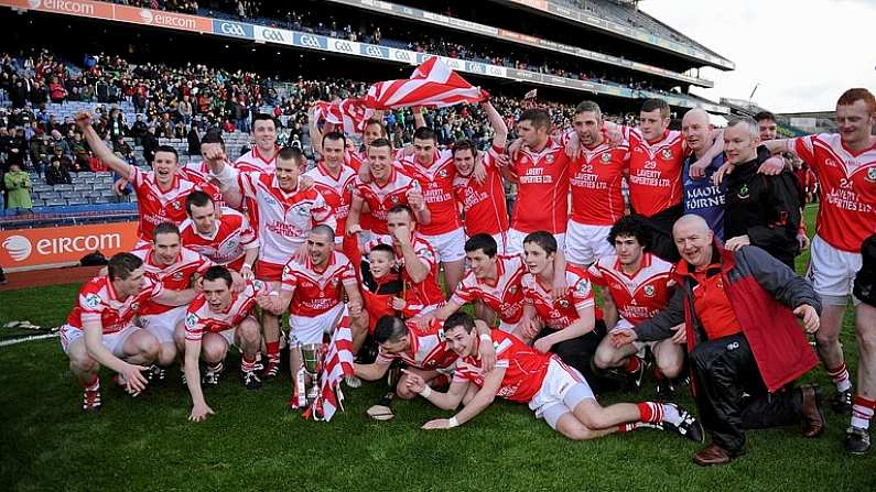 17 March 2012; Members of the Loughgiel Shamrocks squad celebrate with the Tommy Moore Cup. AIB GAA Hurling All-Ireland Senior Club Championship Final, Coolderry, Offaly, v Loughgiel Shamrocks, Antrim, Croke Park, Dublin. Picture credit: Ray McManus / SPORTSFILE