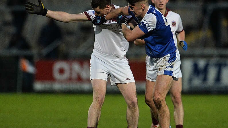 26 November 2017; Padraig McGuigan of Slaughtneil tussles with Barry Fortune of Cavan Gaels during the AIB Ulster GAA Football Senior Club Championship Final match between Slaughtneil and Cavan Gaels at the Athletic Grounds in Armagh. Photo by Oliver McVeigh/Sportsfile