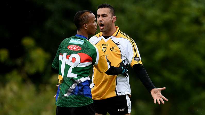 10 August 2016; Hassan Abbas of Middle East confronts Tebogo Phillimon Mongemoratho of South Africa Gaels during the Etihad Airways GAA World Games 2016 - Day 2 at UCD in Dublin. Photo by Sam Barnes/Sportsfile