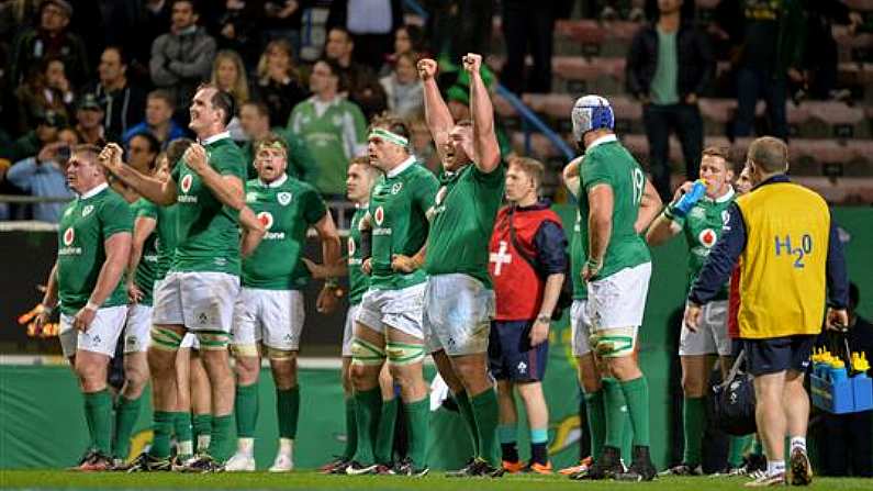 The Irish bench celebrate at the full-time whistle