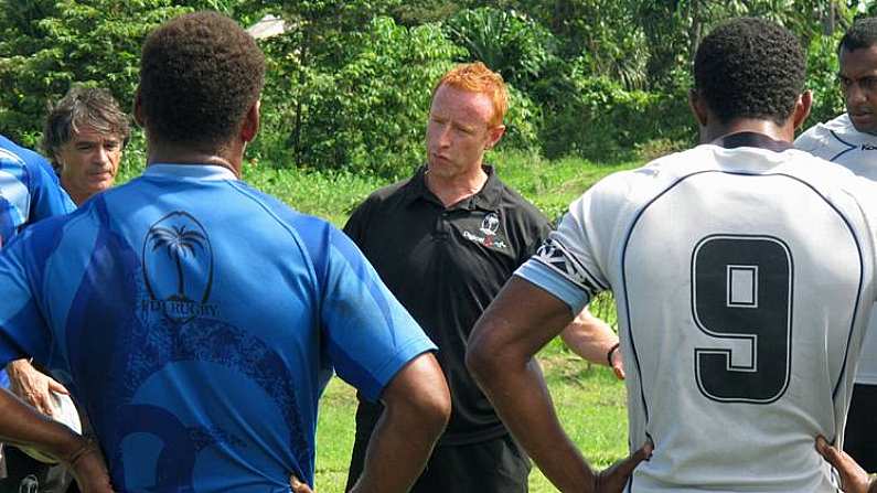 In this , Nov. 7, 2013, file photo, Fiji rugby sevens coach Ben Ryan, center, speaks to his squad in Pacific Harbour, Fiji. Since moving from England in 2013, Ryan has harnessed the passion Fijians have for their kind of football, reinforcing the connections between the game and the people in a Pacific island nation which has become too familiar with seeing its best rugby talent move abroad seeking greater opportunities. (AP Photo/Nick Perry, File)