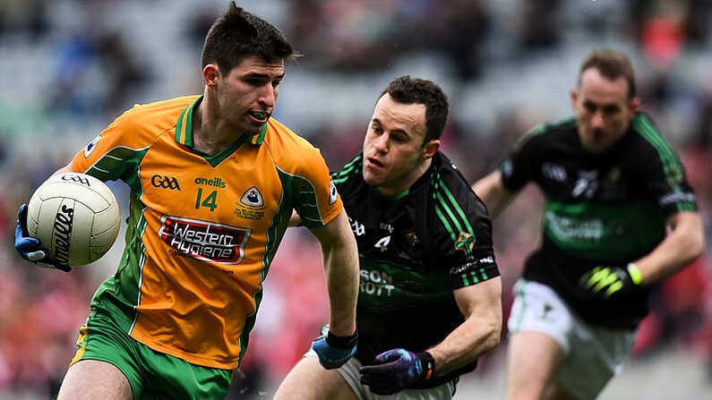 17 March 2018: Martin Farragher of Corofin in action against Alan Cronin of Nemo Rangers during the AIB GAA Football All-Ireland Senior Club Championship Final match between Corofin and Nemo Rangers at Croke Park in Dublin. Photo by David Fitzgerald/Sportsfile