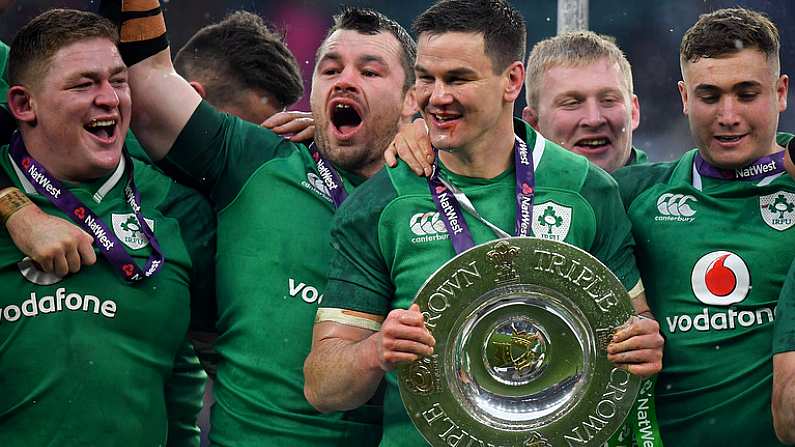 17 March 2018; Ireland players, from left, Tadhg Furlong, Cian Healy, Jonathan Sexton and Jordan Larmour celebrate with the Triple Crown trophy after the NatWest Six Nations Rugby Championship match between England and Ireland at Twickenham Stadium in London, England. Photo by Brendan Moran/Sportsfile