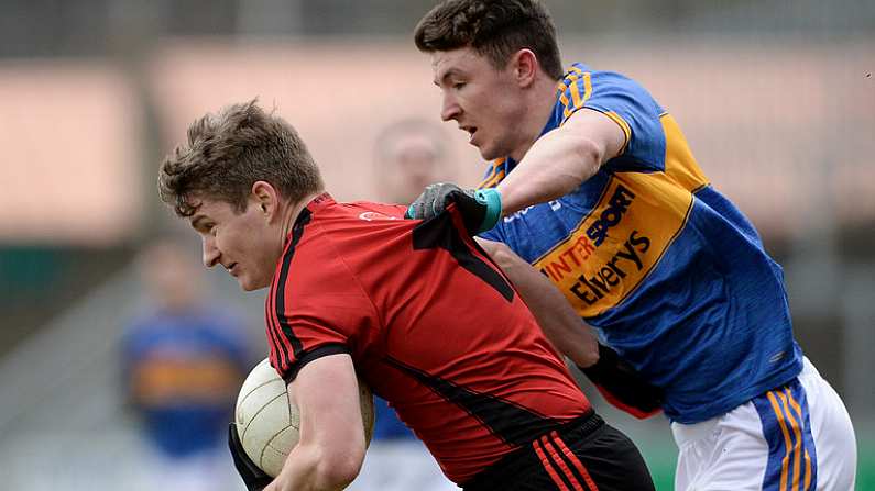 31 March 2018; Conor Maginn of Down in action against Jack Kennedy of Tipperary during the Allianz Football League Roinn 2 Round 6 match between Down and Tipperary at Pairc Esler in Newry, Co Down. Photo by Oliver McVeigh/Sportsfile