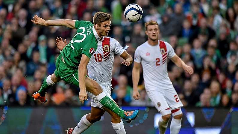 11 October 2014; Kevin Doyle, Republic of Ireland, in action against Yogan Santos, Gibraltar. UEFA EURO 2016 Championship Qualifer, Group D, Republic of Ireland v Gibraltar. Aviva Stadium, Lansdowne Road, Dublin. Picture credit: Barry Cregg / SPORTSFILE