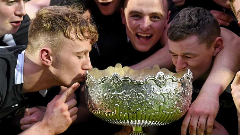 17 March 2015; Tim Carroll, left, and Alan Tynan, CC Roscrea, kiss the cup following their victory. Bank of Ireland Leinster Schools Senior Cup Final, in association with Beauchamps Solicitors, Belvedere College v Cistercian College Roscrea. RDS, Ballsbridge, Dublin. Picture credit: Stephen McCarthy / SPORTSFILE