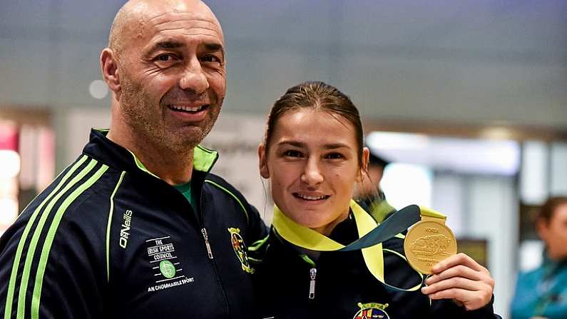 25 November 2014; Team Ireland's Katie Taylor with coach and father Pete Taylor pictured in Dublin Airport on their return from the 2014 AIBA Elite Women's World Boxing Championships in Jeju, Korea. Dublin Airport, Dublin. Picture credit: Barry Cregg / SPORTSFILE