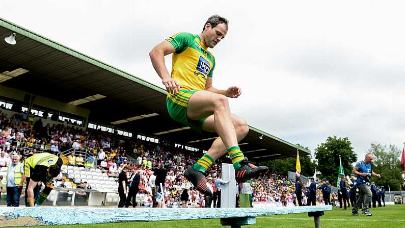 18 June 2017; Michael Murphy of Donegal jumps the bench before the team picture before the Ulster GAA Football Senior Championship Semi-Final match between Tyrone and Donegal at St Tiernach's Park in Clones, Co. Monaghan. Photo by Oliver McVeigh/Sportsfile