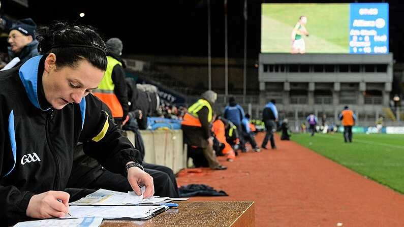 1 February 2014; Fourth official Maggie Farrelly takes notes of substitutions during the game. Allianz Football League Division 1 Round 1, Dublin v Kerry, Croke Park, Dublin. Picture credit: Brendan Moran / SPORTSFILE