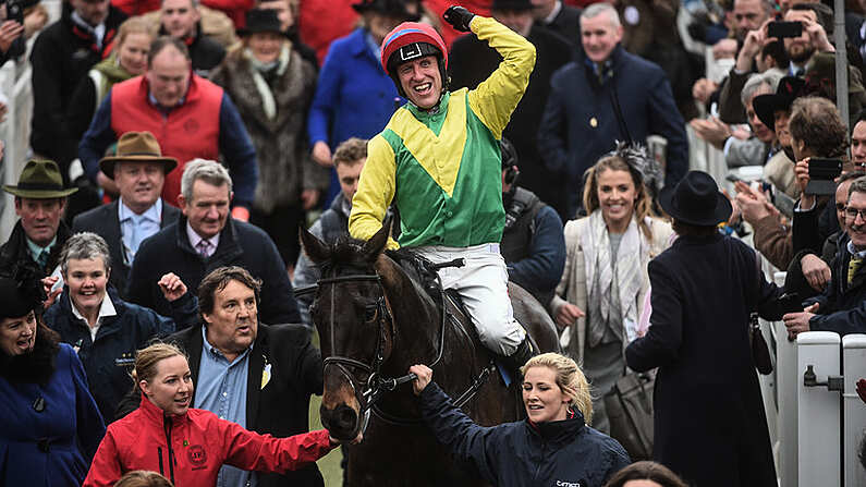 17 March 2017; Robbie Power celebrates as he enters the winner's enclosure after winning the Timico Cheltenham Gold Cup Steeple Chase on Sizing John during the Cheltenham Racing Festival at Prestbury Park in Cheltenham, England. Photo by Cody Glenn/Sportsfile