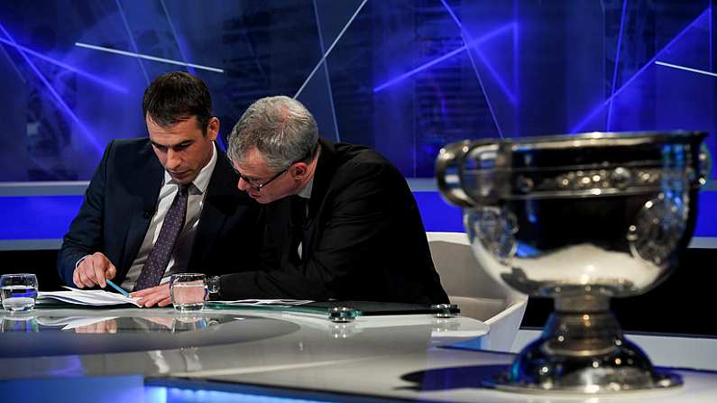 13 October 2016; Football analysts Dessie Dolan, left, and Joe Brolly study the Munster draw ahead of the 2017 GAA Provincial Senior Football and Hurling Championships. RTE Studios, Donnybrook, Dublin. Photo by Brendan Moran/Sportsfile