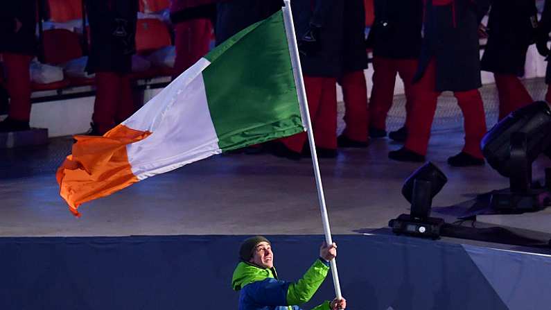 9 February 2018; Flagbearer Seamus O'Connor of Ireland leads his team during the parade of nations at the opening ceremony of the Winter Olympics at the PyeongChang Olympic Stadium in Pyeongchang-gun, South Korea. Photo by Ramsey Cardy/Sportsfile Photo by Ramsey Cardy/Sportsfile