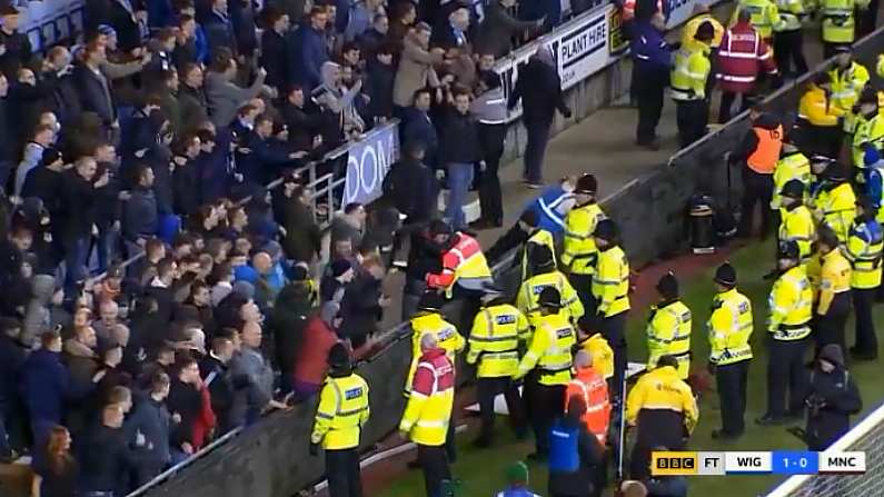 Watch: Manchester City Fans Hurl Bottles & Hoarding At Stewards