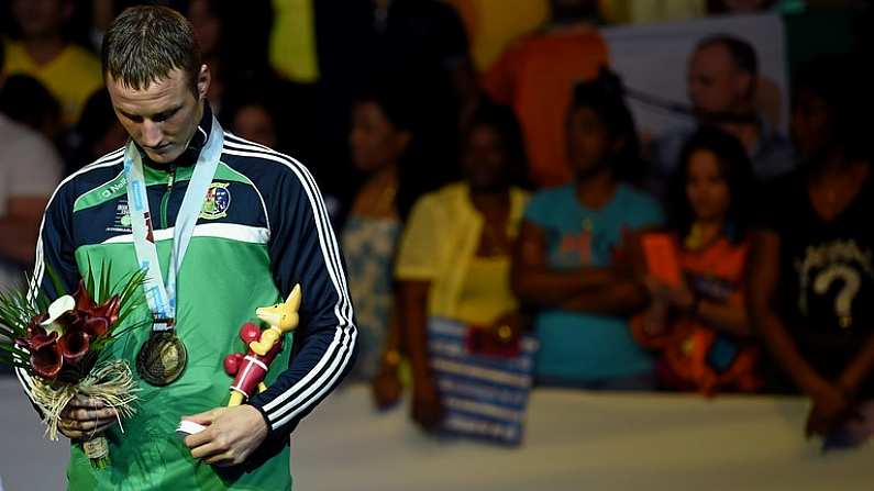 14 October 2015; Michael O'Reilly, Ireland, on the podium with his Men's Middleweight 75kg bronze medal. AIBA World Boxing Championships, Semi-Finals. Ali Bin Hamad Al Attiyah Arena, Doha, Qatar. Picture credit: Paul Mohan / SPORTSFILE