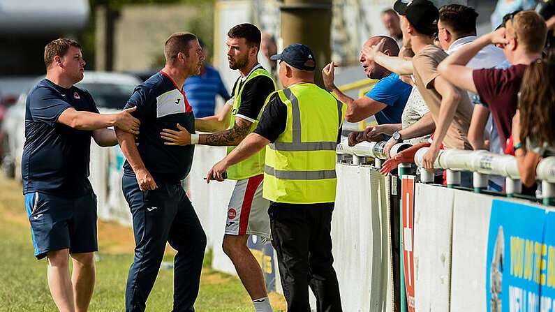 8 July 2018; Sligo Rovers goalkeeping coach Rodney Dalzell, centre, is held back by Sligo Rovers player Patrick McClean and a match steward after a confrontation with Sligo supporters after the SSE Airtricity League Premier Division match between Bray Wanderers and Sligo Rovers at the Carlisle Grounds in Bray, Co Wicklow. Photo by Matt Browne/Sportsfile