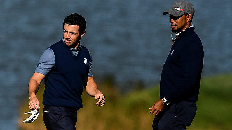 30 September 2016 Rory McIlroy of Europe and USA vice-captain Tiger Woods on the 9th hole during the afternoon Fourball Match against Dustin Johnson and Matt Kuchar of USA at The 2016 Ryder Cup Matches at the Hazeltine National Golf Club in Chaska, Minnesota, USA. Photo by Ramsey Cardy/Sportsfile