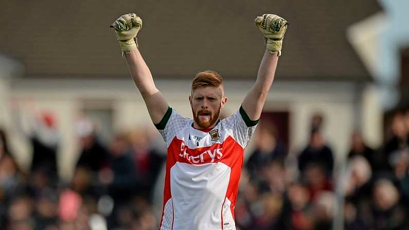 30 April 2016; Mayo goalkeeper Mattie Flanagan celebrates his side's first goal, scored by team-mate Diarmuid O'Connor. EirGrid GAA Football Under 21 All-Ireland Championship Final, Cork v Mayo. Cusack Park, Ennis, Co. Clare. Picture credit: Piaras O Midheach / SPORTSFILE