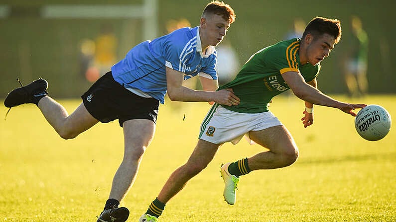 23 May 2018; Conor O'Brien of Meath in action against Josh Bannon of Dublin during the Electric Ireland Leinster GAA Football Minor Championship Round 2 match between Meath and Dublin at Pairc Tailteann in Navan, Co Meath. Photo by Barry Cregg/Sportsfile