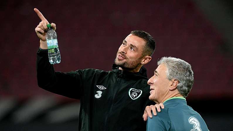 10 October 2013; Republic of Ireland's Damien Delaney with equipment officer Mick Lawlor during squad training ahead of their 2014 FIFA World Cup Qualifier, Group C, game against Germany on Friday. Republic of Ireland Squad Training, Rhine Energie Stadion, Cologne, Germany. Picture credit: David Maher / SPORTSFILE