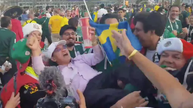 Watch: Random South Koreans Are Being Mobbed By Mexican Football Fans